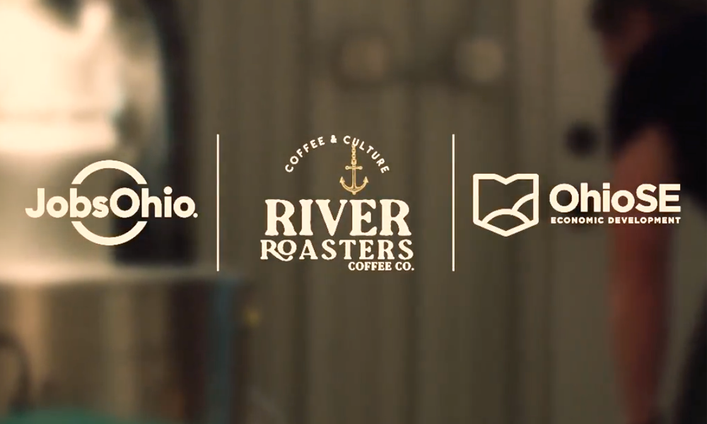 Jobs Ohio, River Roasters Coffee Co and Ohio SE Economic Development logos on blurry background